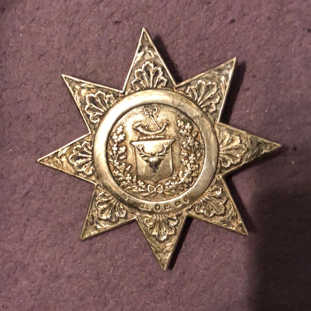 Large sterling silver star shaped brooch or belt buckle